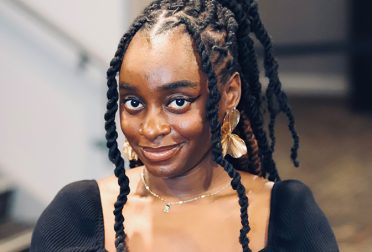 Rita Uganden-Teryila smiles for the camera.