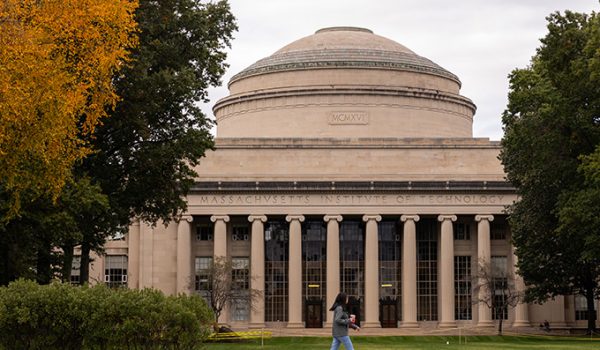 The MIT Dome, with a single person crossing in front.